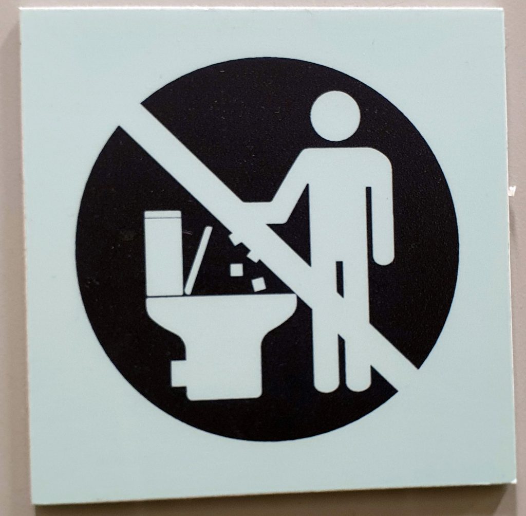 Schild: kein Papier in die Toilette werfen