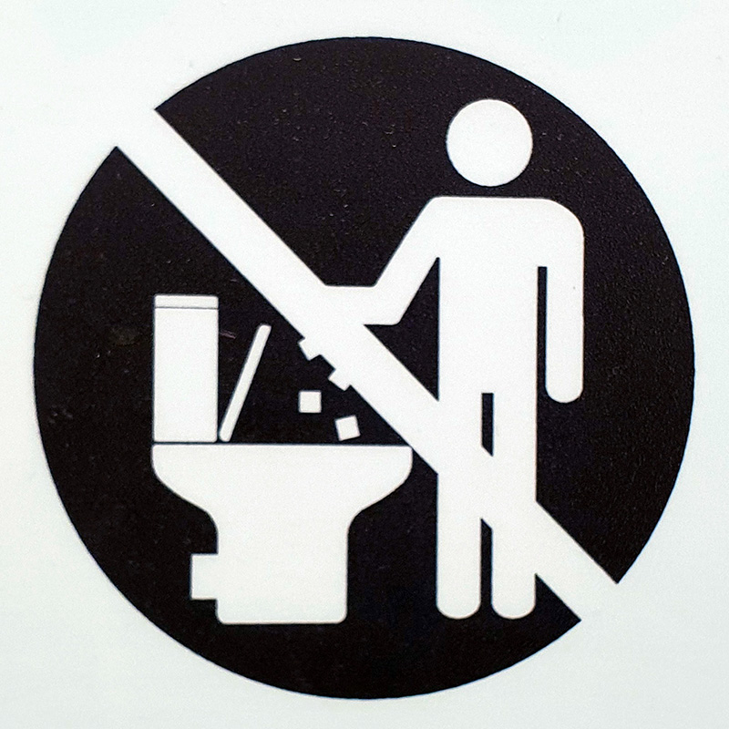 Schild: kein Papier in die Toilette werfen