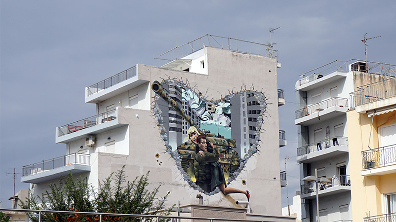 Bild auf Hausfassade in Athen